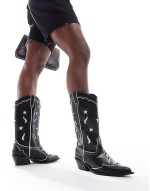 pattern western boot in black and ecru